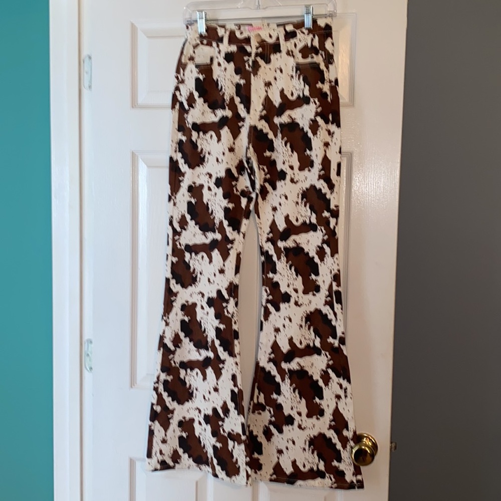 New! Cow print bell bottom rodeo jeans (southern fried chics boutique)